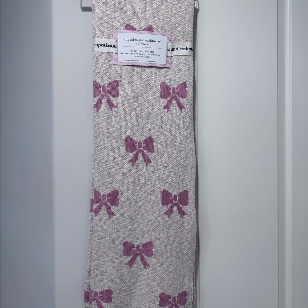 cupcakes & cashmere Cream Throw with Pink Bow Accents